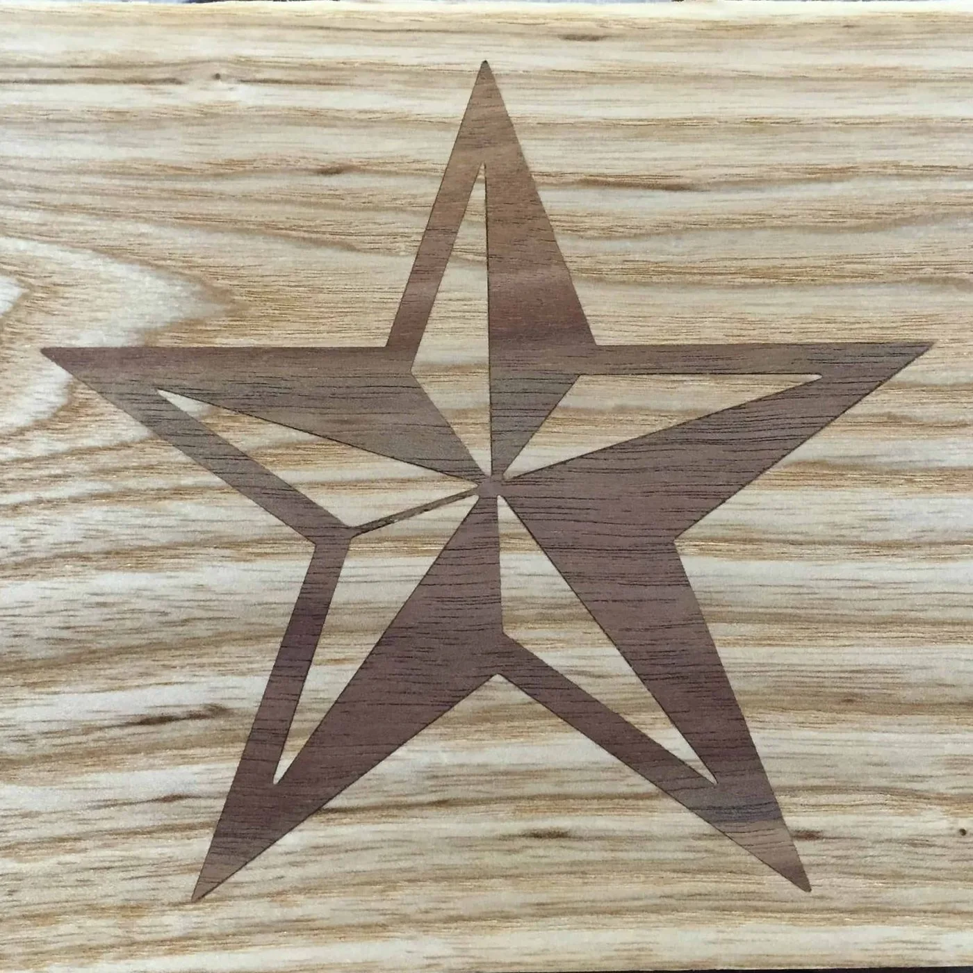 Texas Lone Star inlaid in walnut on ash, made by TavenWood in Royse City, Texas
